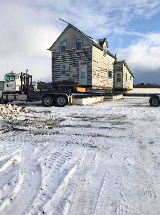 Fagriskogur is put on its new foundation in Riverton Moving Fagriskogur 6